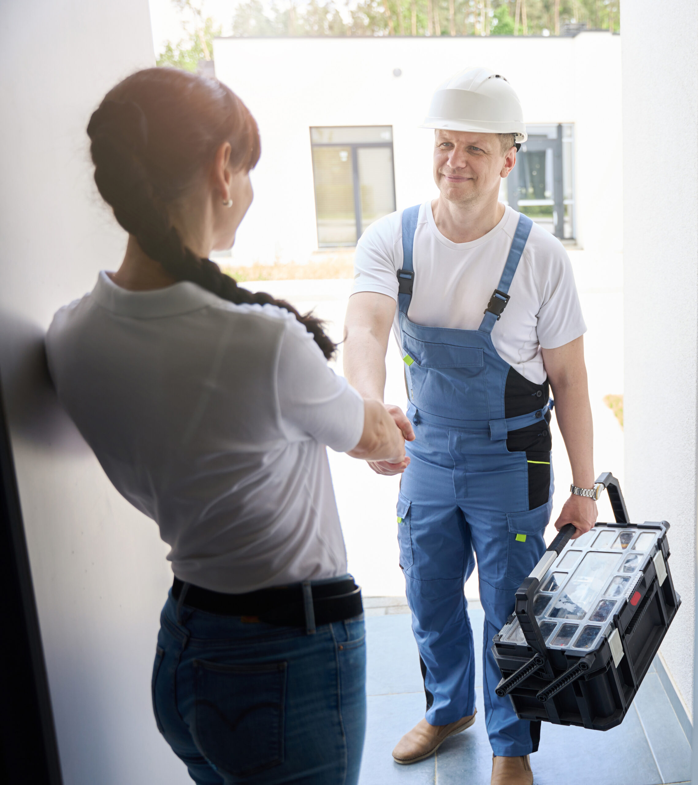 Technician greeting a home owner