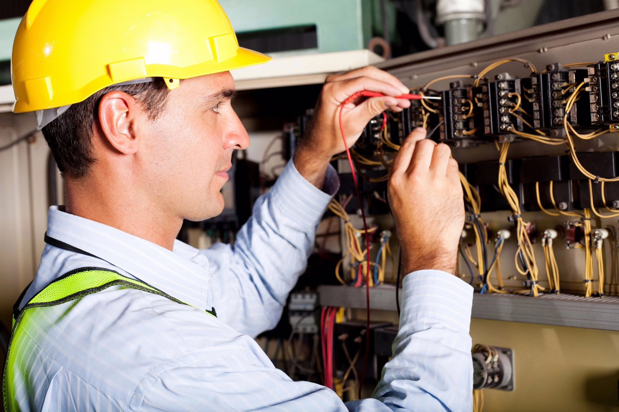electrician working on a panel